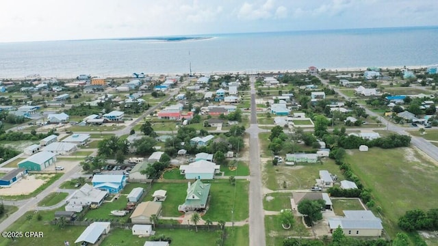 aerial view with a water view and a residential view