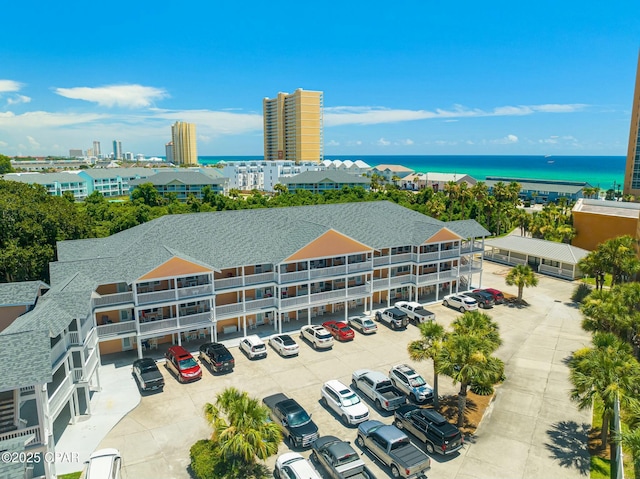 birds eye view of property with a water view