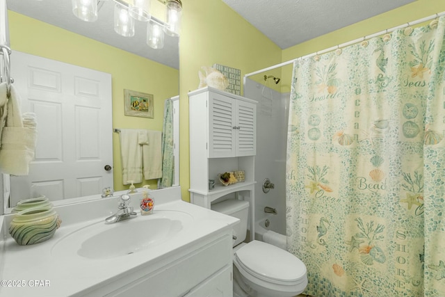 bathroom featuring shower / bath combo, a textured ceiling, toilet, and vanity