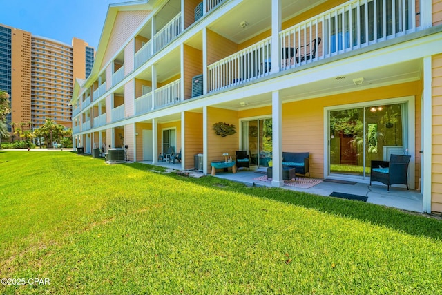 exterior space with a yard, central AC unit, and a patio