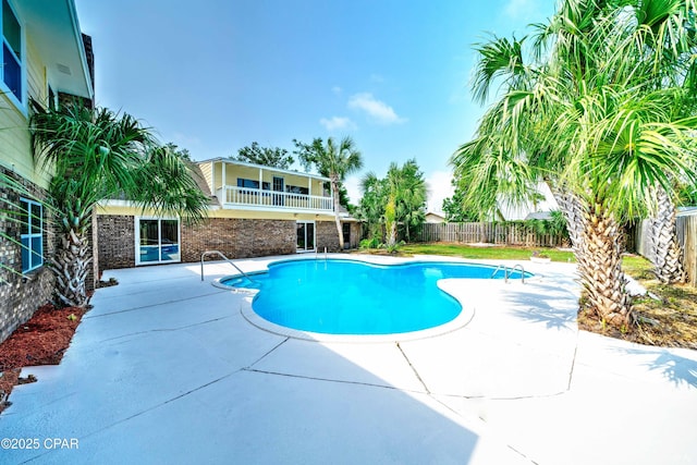 view of pool with a fenced in pool, a patio area, and a fenced backyard