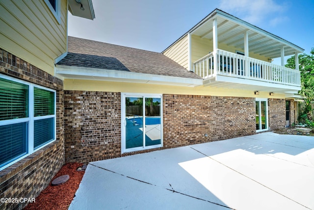 exterior space with a balcony