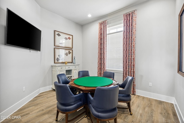 rec room featuring light wood finished floors, recessed lighting, and baseboards