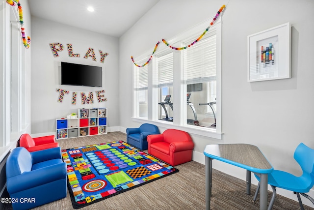 playroom with recessed lighting and baseboards