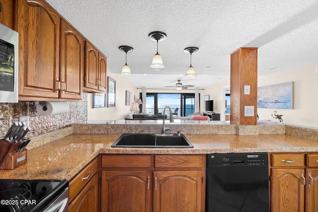 kitchen featuring a peninsula, a sink, brown cabinets, dishwasher, and pendant lighting