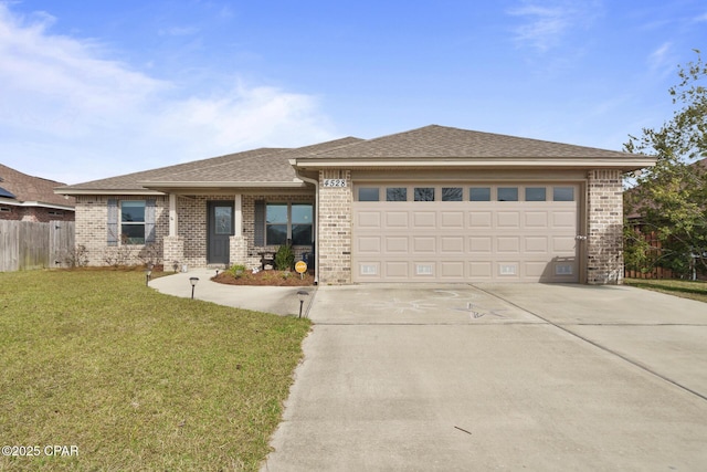 prairie-style house with a front yard and a garage