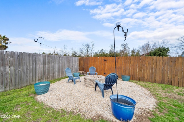 exterior space featuring a patio area and an outdoor fire pit