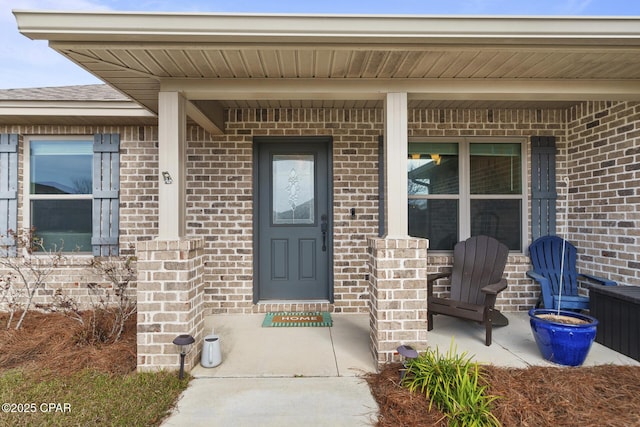 doorway to property with a porch