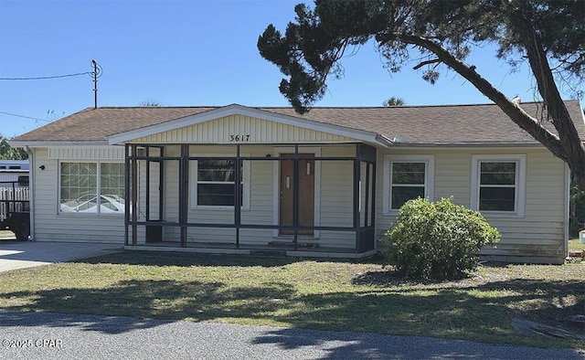 view of front of house with a front lawn and a porch