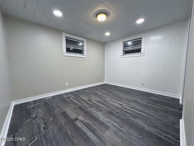 basement featuring dark wood-type flooring