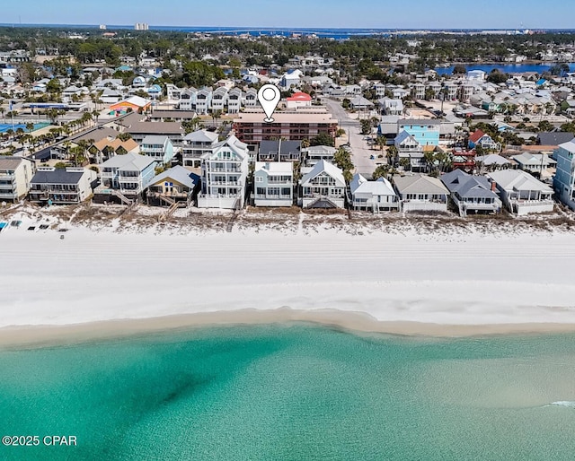 bird's eye view with a beach view and a water view