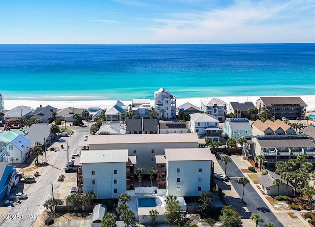 bird's eye view featuring a water view and a residential view