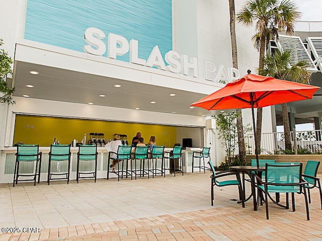 9860 S Thomas Dr Unit 1919, Panama City, FL 32408 - exterior space featuring a patio and outdoor dry bar