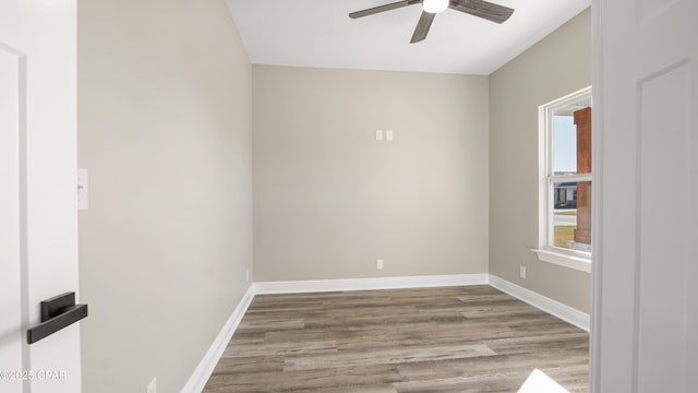 empty room with light hardwood / wood-style floors and ceiling fan