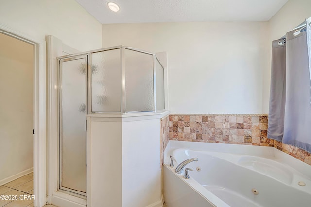 full bath featuring a whirlpool tub, tile patterned flooring, and a shower stall