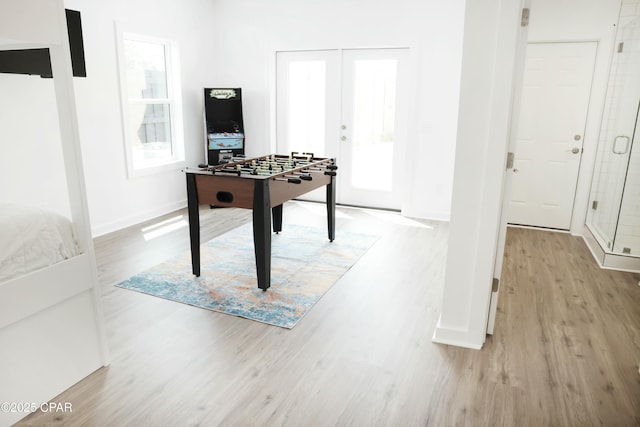 4112 Snapper St, Panama City Beach, FL 32408 - playroom featuring french doors, baseboards, and wood finished floors