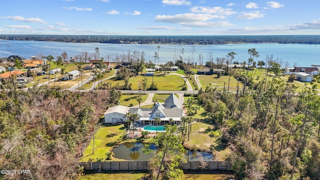 7331 Resota Ln, Southport, FL 32409 - aerial perspective of suburban area featuring a pool area and a large body of water