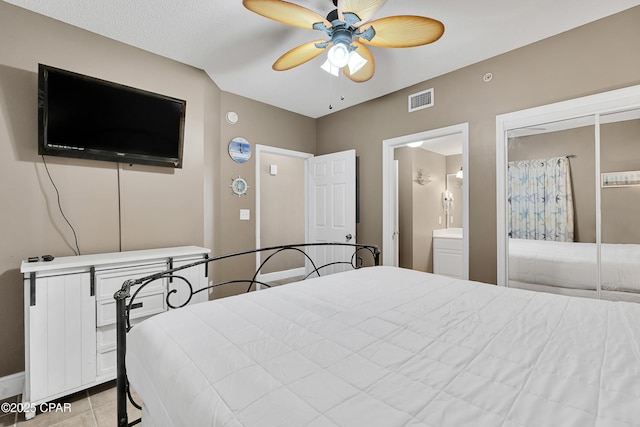 bedroom with light tile patterned flooring, visible vents, and ceiling fan