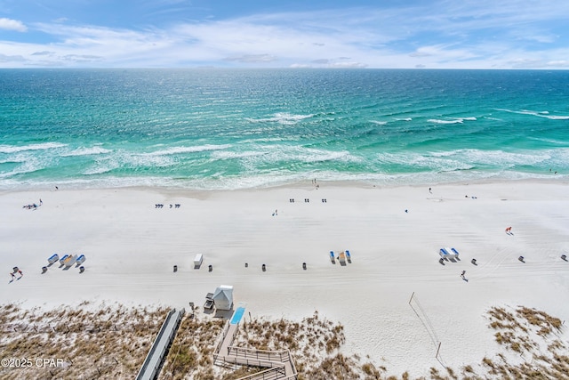 aerial view featuring a water view and a view of the beach