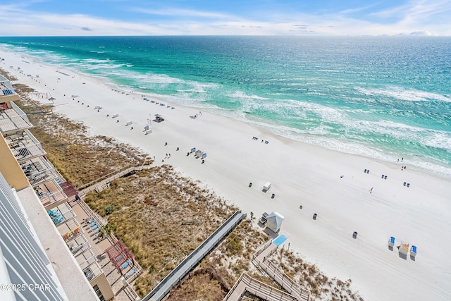 aerial view with a view of the beach and a water view