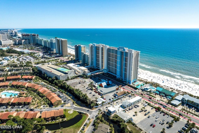 drone / aerial view with a water view and a view of city