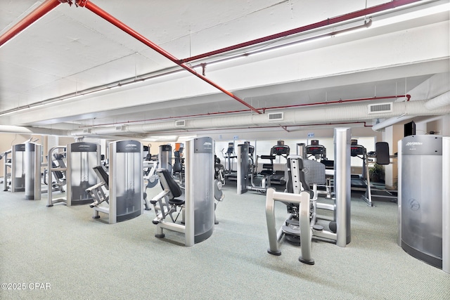 exercise room featuring visible vents