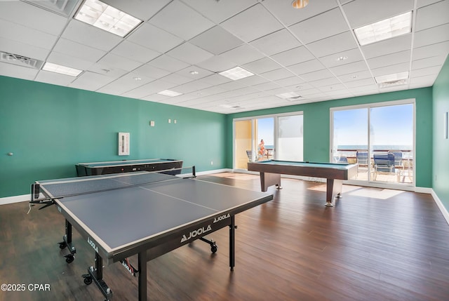 game room featuring visible vents, wood finished floors, baseboards, pool table, and a paneled ceiling