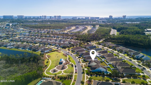 bird's eye view with a water view