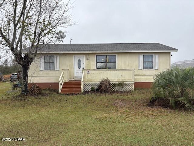 view of front of house with a front yard