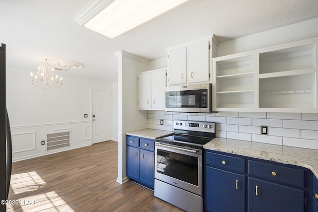 kitchen with stainless steel appliances, blue cabinets, dark wood finished floors, and open shelves