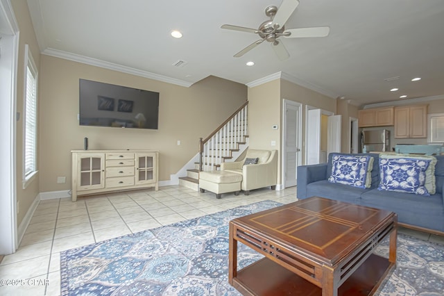 living room with stairs, ornamental molding, light tile patterned flooring, and plenty of natural light