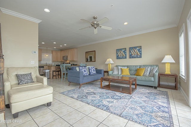 living area featuring light tile patterned floors, ornamental molding, and recessed lighting