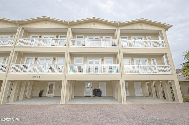 view of building exterior featuring a carport