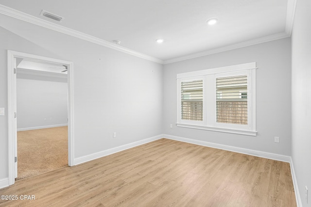 196 Martingale Loop, Lynn Haven, FL 32444 - spare room with light wood-style flooring, ornamental molding, baseboards, and recessed lighting