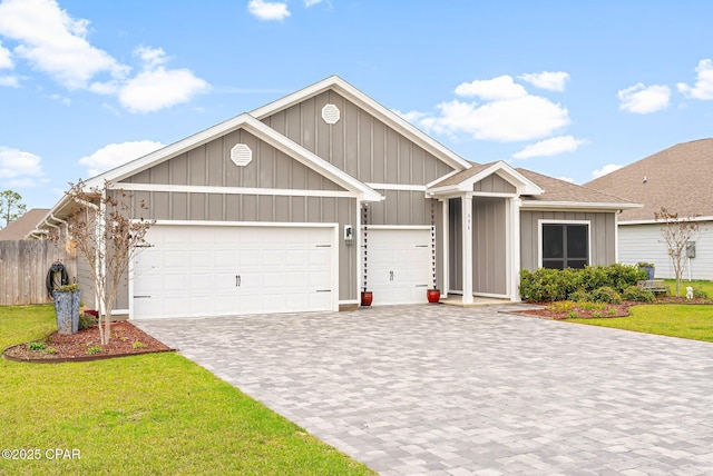 196 Martingale Loop, Lynn Haven, FL 32444 - view of front of home with an attached garage, decorative driveway, and board and batten siding