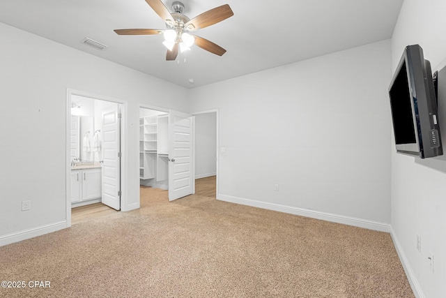 196 Martingale Loop, Lynn Haven, FL 32444 - unfurnished bedroom featuring light carpet and baseboards