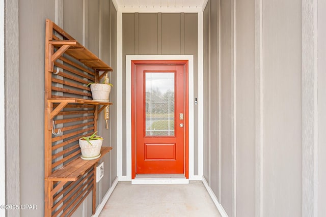 196 Martingale Loop, Lynn Haven, FL 32444 - doorway to property featuring board and batten siding