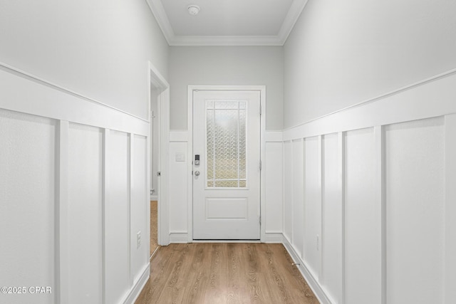 196 Martingale Loop, Lynn Haven, FL 32444 - entryway with ornamental molding, wood finished floors, and a wainscoted wall