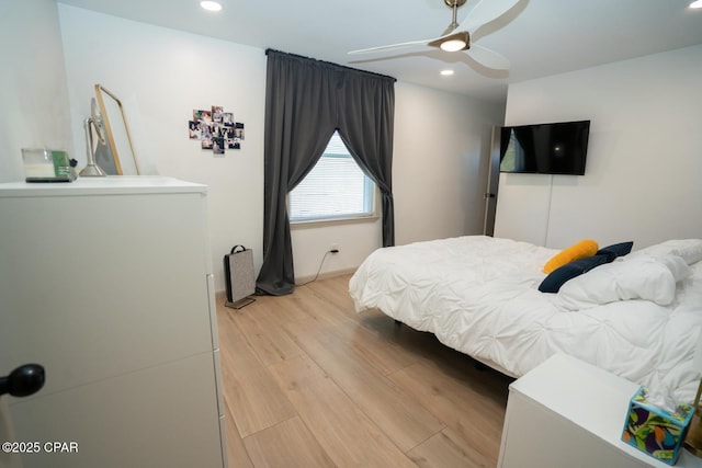 bedroom featuring light wood-type flooring, ceiling fan, and recessed lighting