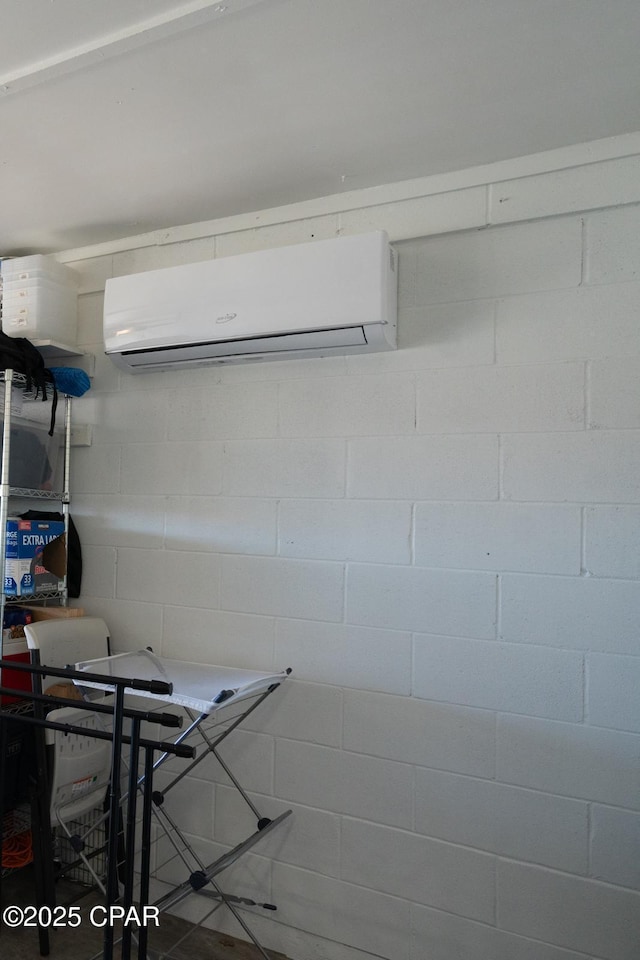 interior space featuring an AC wall unit