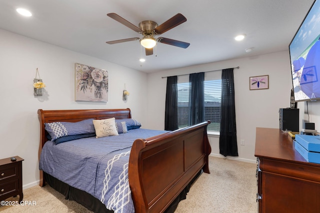 bedroom with recessed lighting, light colored carpet, and ceiling fan