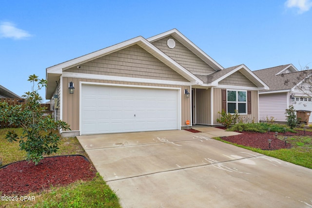 ranch-style home featuring concrete driveway, board and batten siding, and an attached garage