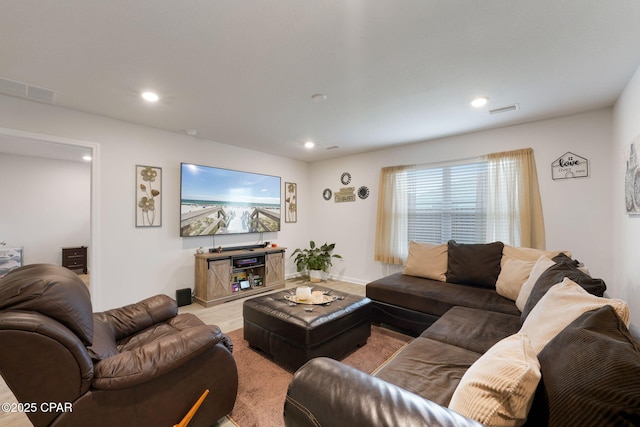 living room with recessed lighting and visible vents