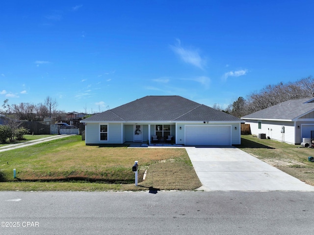 ranch-style home with an attached garage, concrete driveway, a porch, and a front yard