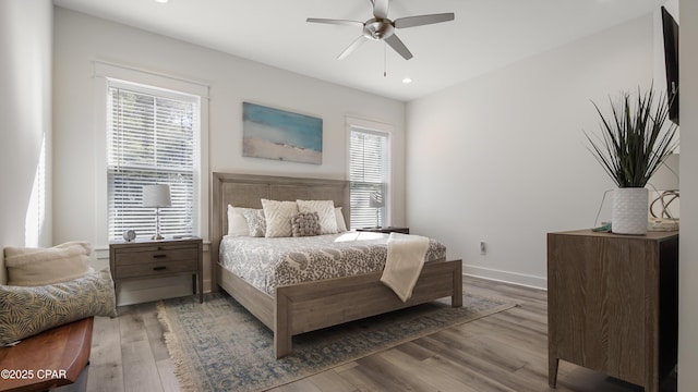 150 Grande Pointe Cir, Inlet Beach, FL 32461 - bedroom with multiple windows, wood finished floors, recessed lighting, and a ceiling fan