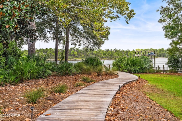 view of community with a water view