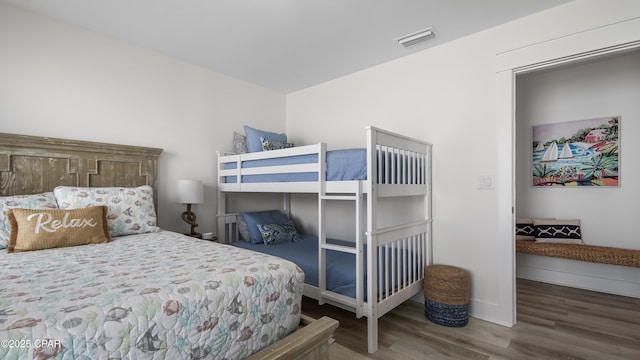 150 Grande Pointe Cir, Inlet Beach, FL 32461 - bedroom featuring wood finished floors and baseboards