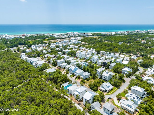 bird's eye view featuring a water view and a residential view