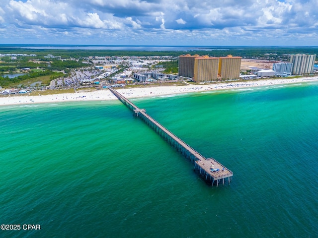 drone / aerial view of waterfront with a beach