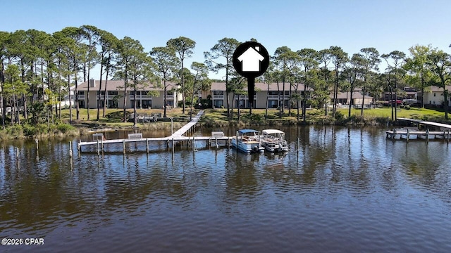 view of dock with a water view